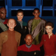 Look at all these happy people, having a great time on the most chipper and light-hearted Star Trek series around!